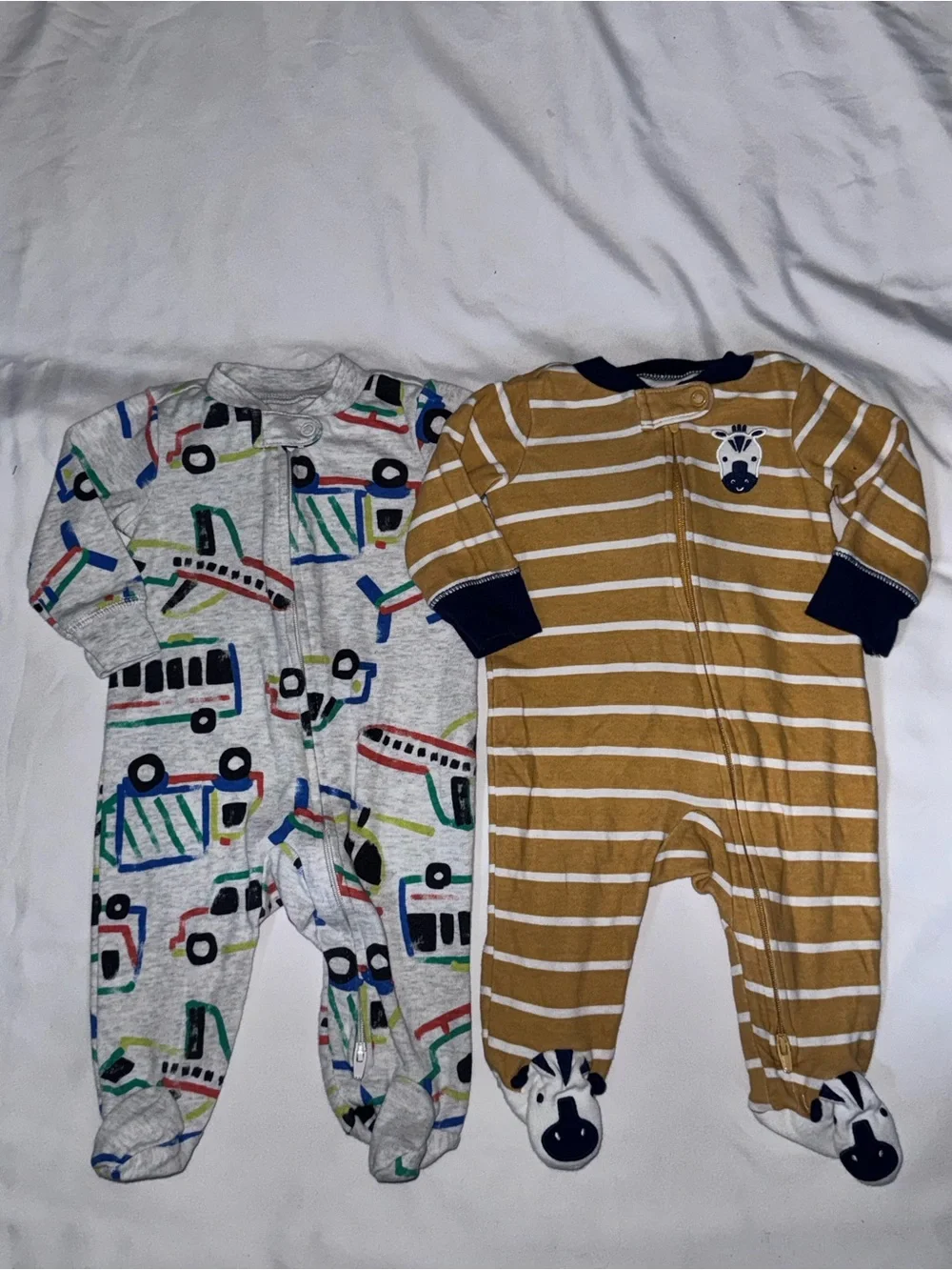 Carter's size 3 months Mustard Stripe and Multi-Vehicle Footed One-Pieces bundle